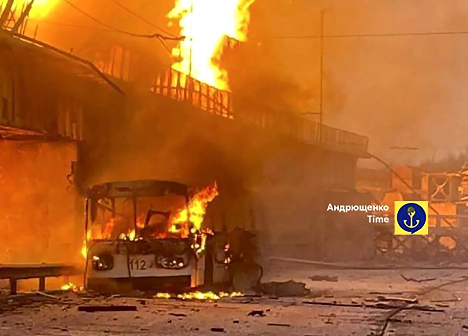 In this photo provided by Petro Andryuschenko, the adviser of the head of Mariupol city's administration, burning trolleybus is seen on the damp of hydroelectric power station after Russian attacks in Dnipro, Ukraine, Friday, March 22, 2024. Over 60 drones and almost 90 missiles of various types were fired that night, Ukrainian officials said. (Telegram Channel of Petro Andryuschenko, the adviser of the head of Mariupol city's administration via AP)